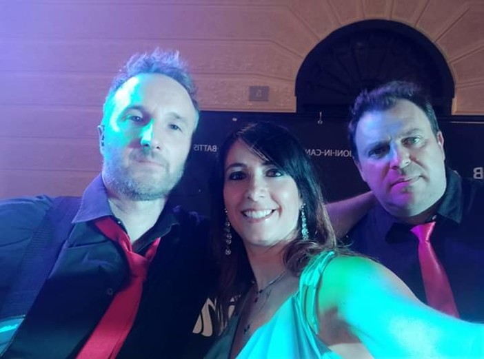 Nelle due foto: gli "Emozioni in canzoni" e Umberto Santoro