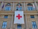 Il Palazzo di Regione Liguria espone la bandiera della Croce Rossa, resterà fino all’8 maggio