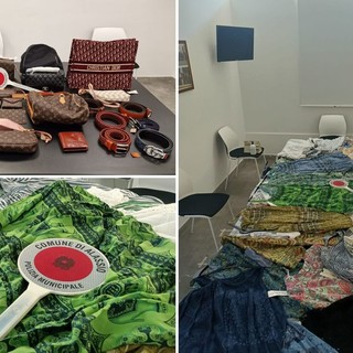 Commercio abusivo ad Alassio, sequestrati duecento pezzi: una ventina di portafogli e borse griffate