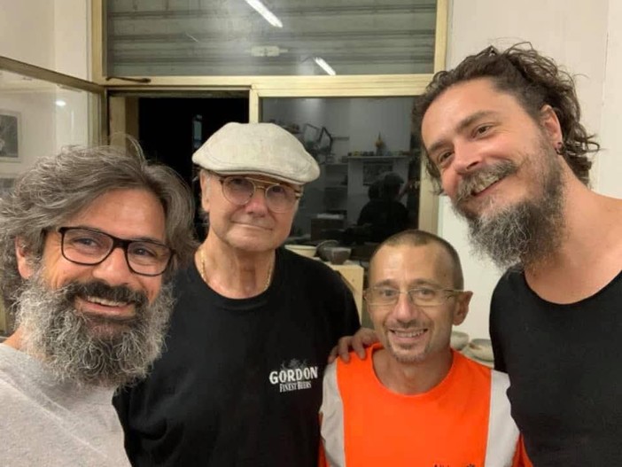 Carlo Pescio, il secondo da sinistra nella foto di Gabriele Resmini