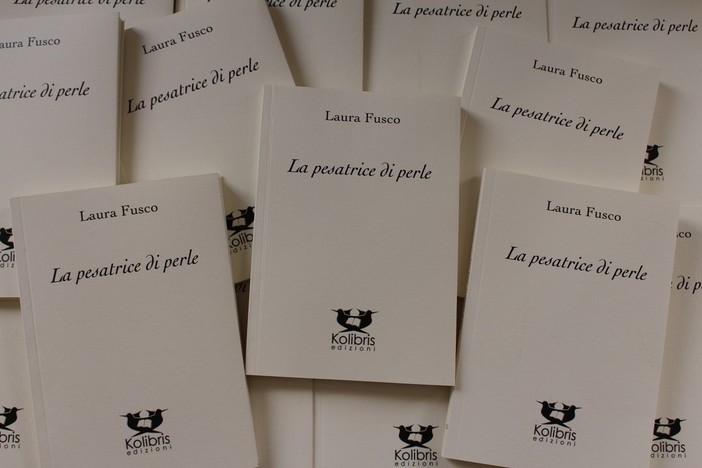 La Pesatrice di perle di Laura Fusco presentato alla Feltirnelli di Savona dal Professor Felice Rossello