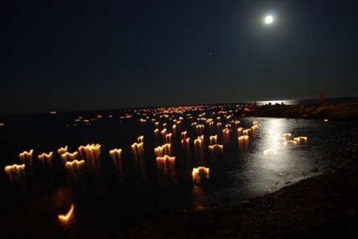 A Loano fiaccole nella notte e balli occitani