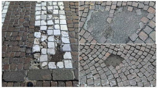 Savona, in piazza Mameli porfido sconnesso, rattoppi di asfalto e buche: rischio per moto e pedoni