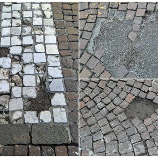 Savona, in piazza Mameli porfido sconnesso, rattoppi di asfalto e buche: rischio per moto e pedoni