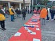 Vado dice no alla violenza contro le donne: posizionati su un telo rosso tutti i nomi delle vittime del 2021-2022