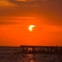 Eclissi parziale di sole, lo spettacolo al tramonto nei cieli d'Italia